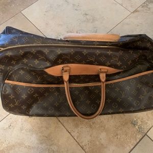 louis vuitton suitcase with wheels